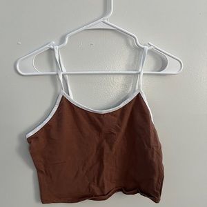 a brown with white crop top